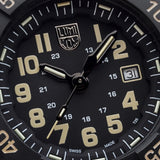 Front view of the Luminox Navy SEAL Men's 45mm Quartz Watch XS.3510 with a black dial and white luminous numerals. This Navy SEAL 3500 Series watch features a black CARBONOX™ case, a black rotating dive bezel and a matching black strap.