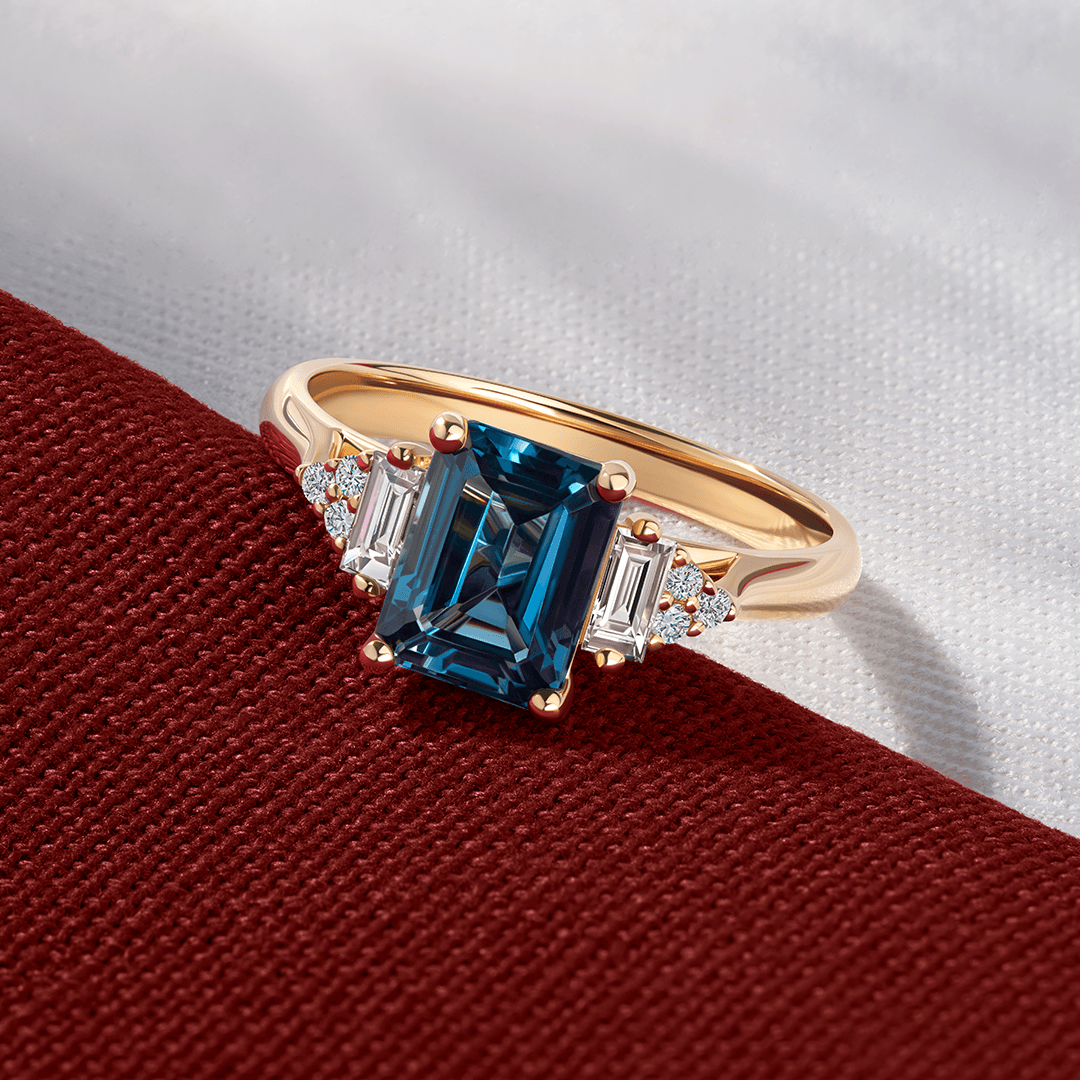 Bluebird London Blue Topaz & 0.26ct TW Diamond Ring in 9ct Yellow Gold - Wallace Bishop