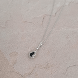 Bluebird™ Sapphire & 0.22ct Diamond Pear Halo Pendant with Chain in 9ct White Gold