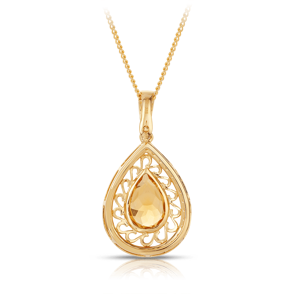 Citrine and 2025 diamond pendant