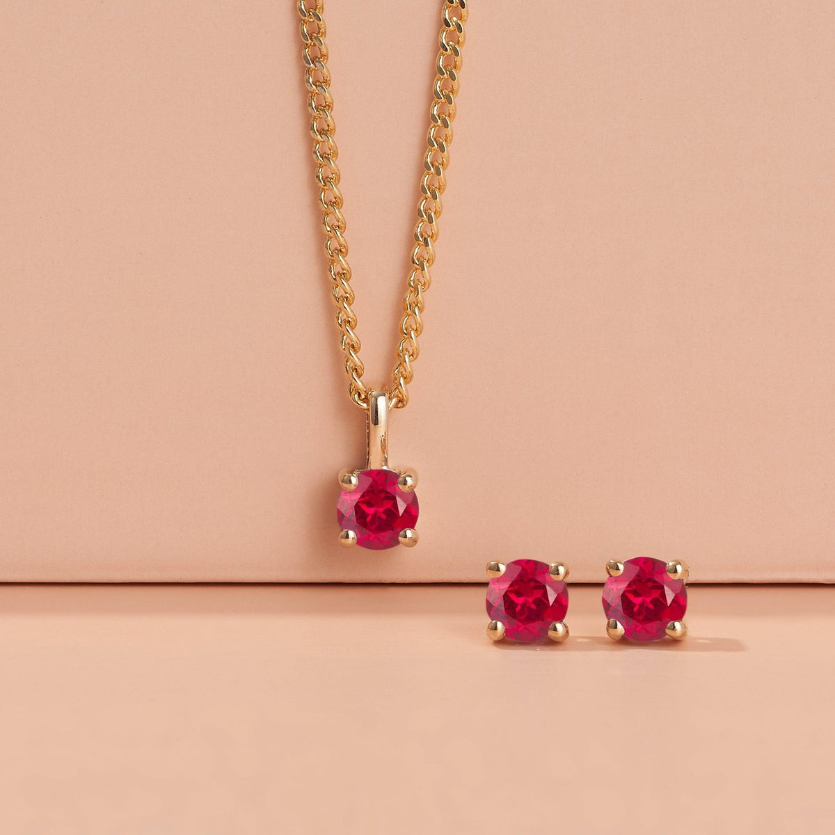 Created Ruby Round Stud Earrings in 9ct Yellow Gold - Wallace Bishop