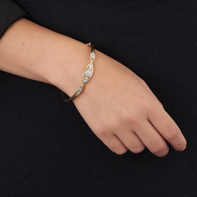 Diamond Bangle in 9ct Yellow and White Gold TGW 0.20ct - Wallace Bishop