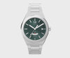  The Timex Q Continental GMT TW2Y24800 features a verdant green dial with radial texture and faceted hour markers. A GMT window sits at 6 o'clock, with a date window beside the 3rd hour marker.