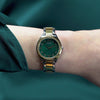 Worn on the wrist, the Guess Charlotte sits comfortably thanks to its petite 30mm case size. The green dial and crystal-embellished bezel add a striking touch to any outfit.