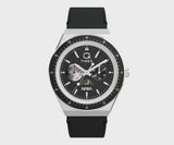 This angle highlights the multifunction sub-dials, including the luminous moon graphic and day/night indicator. The stainless steel case catches the light across its brushed finish.