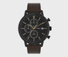 The Timex Chicago Chronograph TW2W13200 features a textured black dial with gold-tone hands and accents. Three sub-dials display 60-second, 30-minute, and 24-hour chronograph functions.