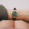 Worn on the wrist, the Guess Array sits comfortably thanks to its petite 28mm case size. The green dial and crystal case details add a colourful, playful touch to any outfit.