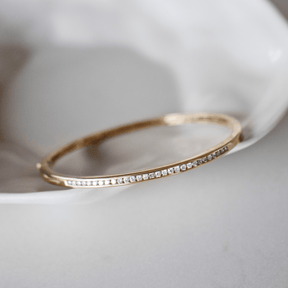 Round Brilliant Cut Channel Set Diamond Oval Bangle in 9ct Yellow Gold - Wallace Bishop