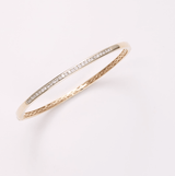 Round Brilliant Cut Channel Set Diamond Oval Bangle in 9ct Yellow Gold - Wallace Bishop